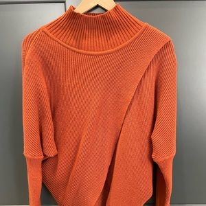 Burt orange sweater